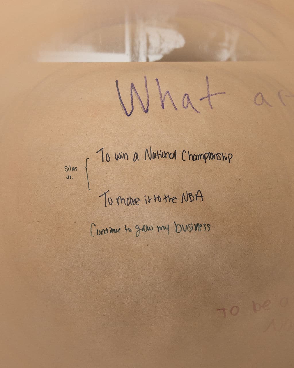 Handwritten goals from Silas Demary Jr. on the goals wall