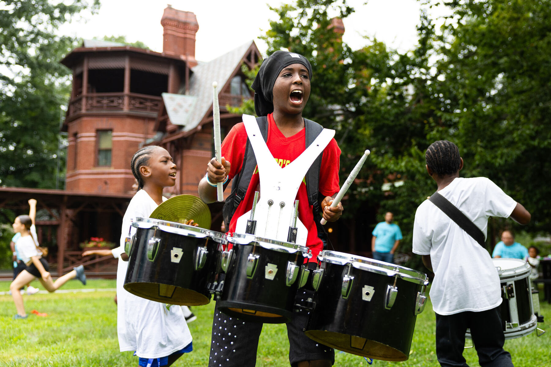 Hartford drumline performing outdoors at the Back to School Bash